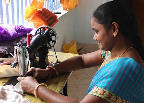 Woman with sewing machine